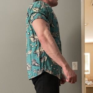 blue and white shell print short sleeve y2k button up shirt collared graphic tee